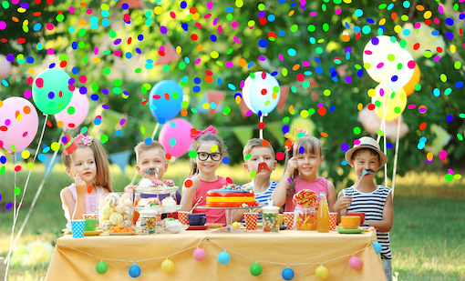 Children celebrating birthday in park